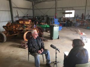 Beacon local Bruce being interviewed by the ABC in the shed